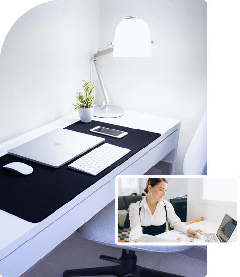 Image of white office desk in a corner.